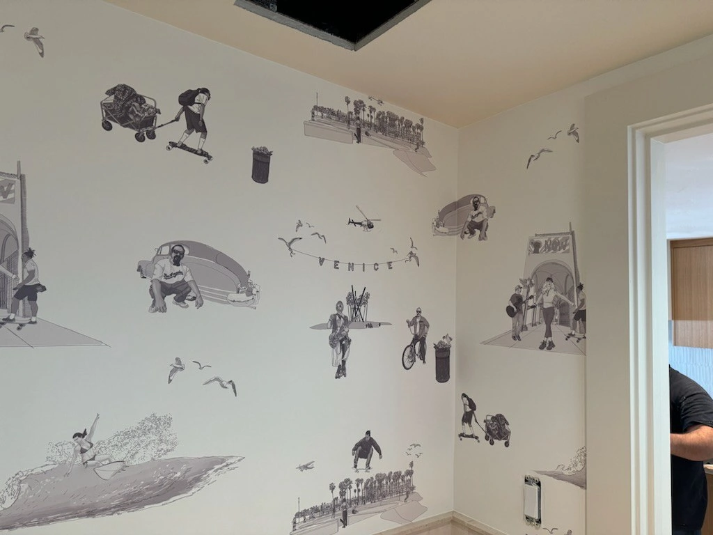Luxury wallpaper installation in a modern living room by Perfect Touch Wallpapers